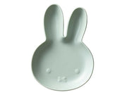 Light gray bunny-shaped dish on a white background