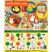 Promotional image of Miffy-themed cafe set with various items on a wooden table.